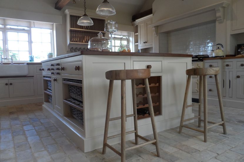 Bespoke country farmhouse kitchen island with in-built wine rack and handmade stools
